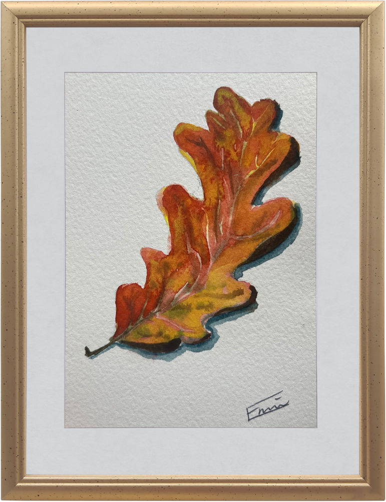 Framed artwork of a colorful leaf on a textured white background